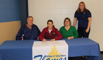 (L to R) Todd Carlson, Jamie Carlson, Beth Carlson, and Coach Samantha Hammond