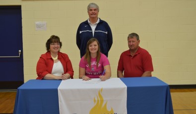 Brenna Meyer on signing day with CSM.