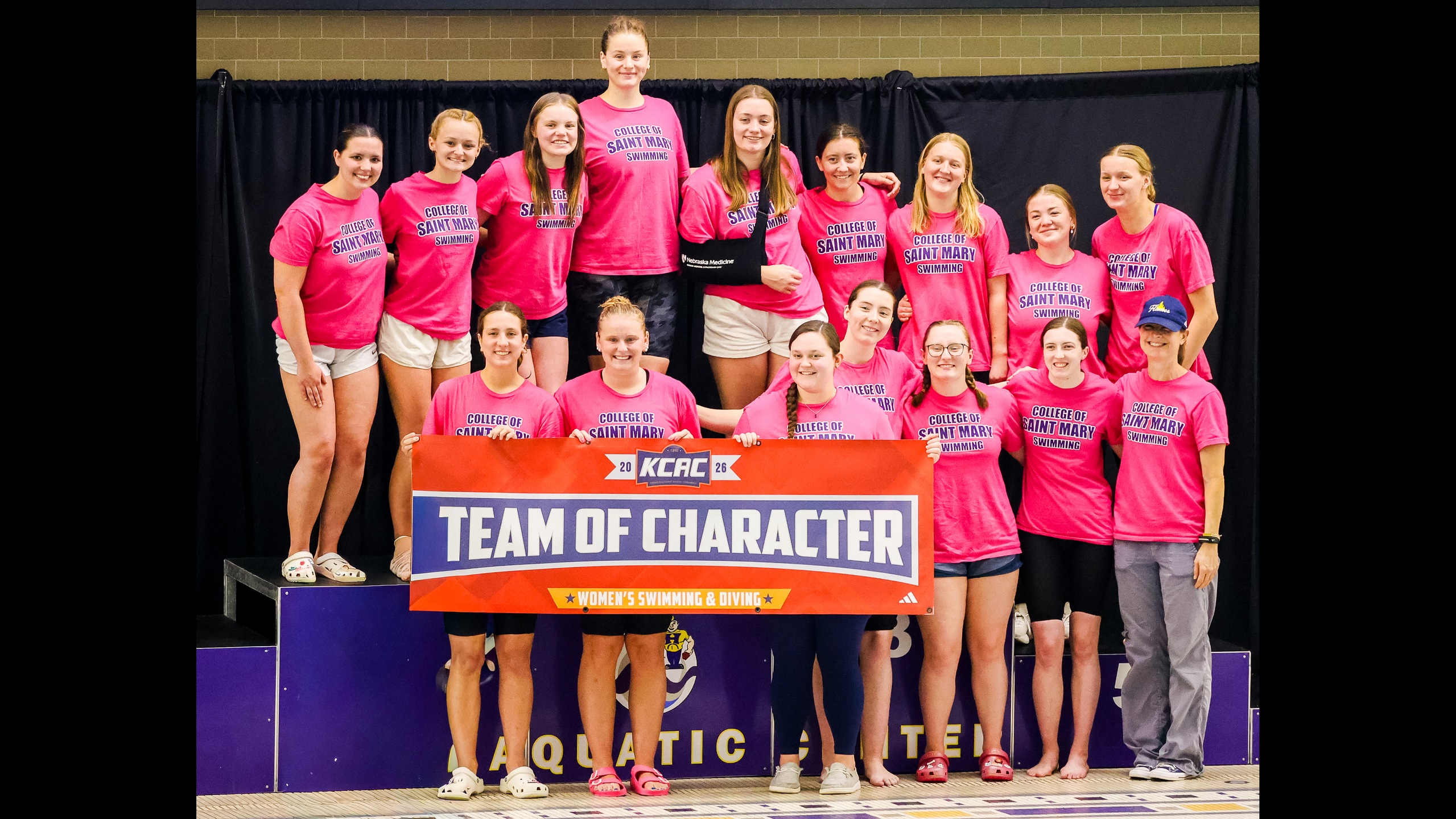 Flames swimmers win KCAC Team of Character award