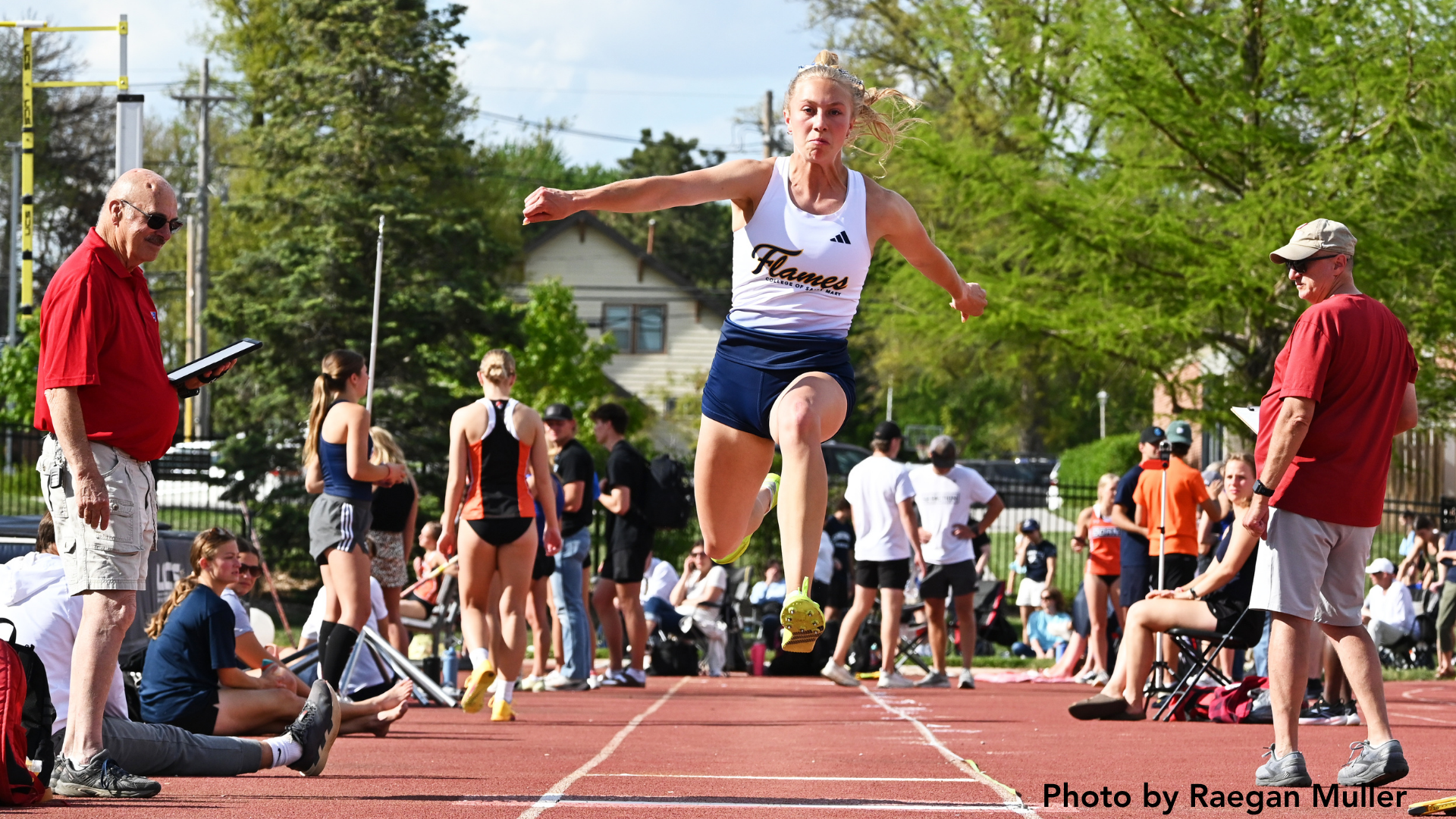 Isaacson, 4x800 relay set program records